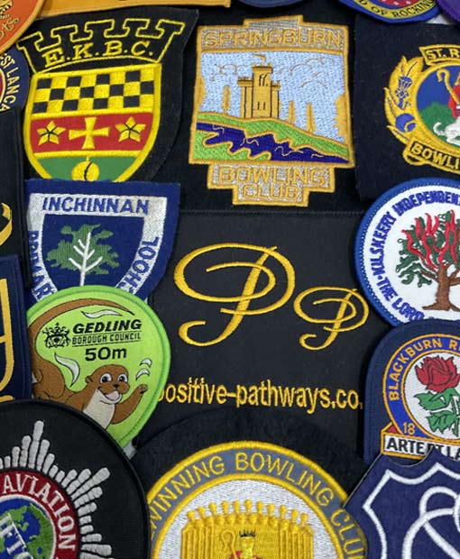 Samples of Embroidered Badges as a group